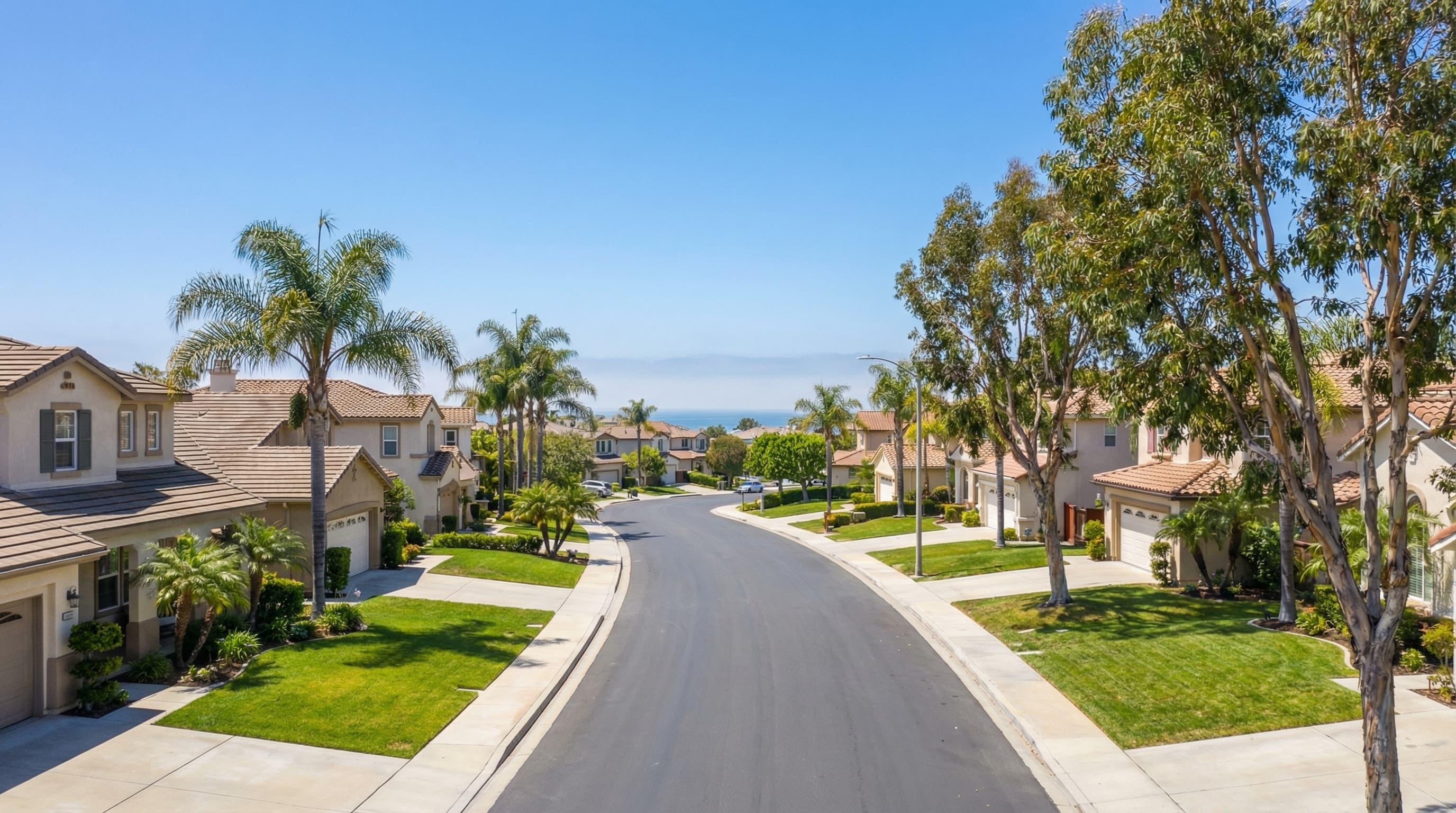 Well-maintained Torrance California residential neighborhood with single family homes and palm trees near coast